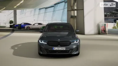 Фото BMW 4 Series Gran Coupe 2023 на фоне природы