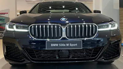 Фото BMW 530e 2023 с различными дизайнерскими решениями