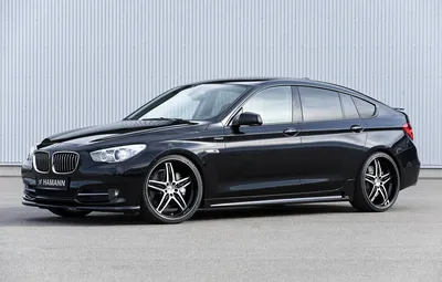 BMW M550i Gran Turismo 2023: фото на закате