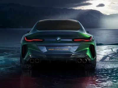 Фотографии BMW M8 Competition Gran Coupe 2023 на черном фоне 