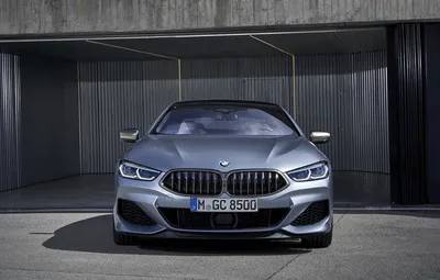 Красивые фото BMW M850i Gran Coupe 2023 на фоне горных вершин