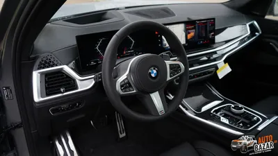 Фото BMW X7 xDrive40i 2023 на заднем плане