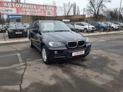 Фотографии BMW X7 xDrive40i 2023 в дождливую погоду