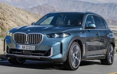 Изображения BMW X7 xDrive45e 2023 в движении