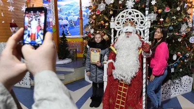 Фото Дома Деда Мороза с использованием множества фоторамок