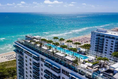 Фотка дома в Майами с видом на океан: Бесплатные обои для windows.
