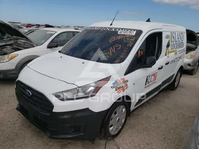 Фото Ford Transit Connect Wagon 2023 с открытыми дверями