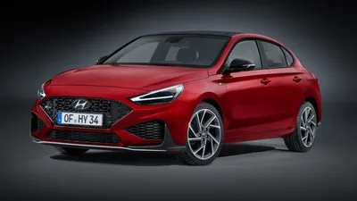 Фото Hyundai i30 N Fastback 2023 в разных условиях освещения