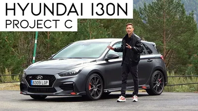 Фото Hyundai i30 N Fastback 2023 на фоне зимней природы