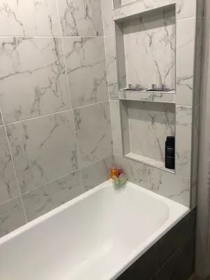 Фотографии ванной комнаты с эффектными укладками плитки