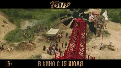 Фотография кинозвезды Игоря Зайцева на фоне киноафиш