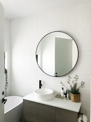 4K фотография круглого зеркала в ванной