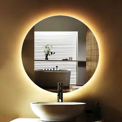 Арт фото круглого зеркала в ванной