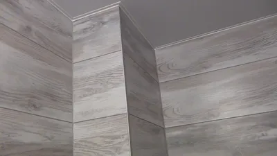 Интересные идеи использования ламината на стенах в ванной