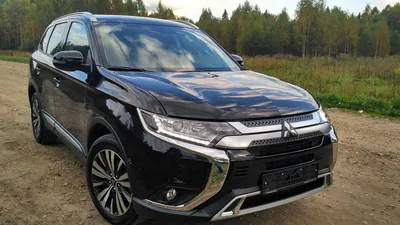 Фотография Mitsubishi Outlander с видом сбоку