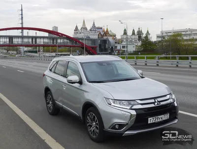 Фотография Mitsubishi Outlander сетку в гриле