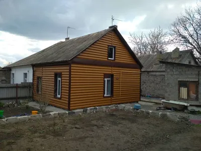 Фон изображения - металлосайдинг под дерево