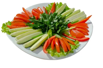 Изображение нарезки овощей на праздничном столе в формате WebP