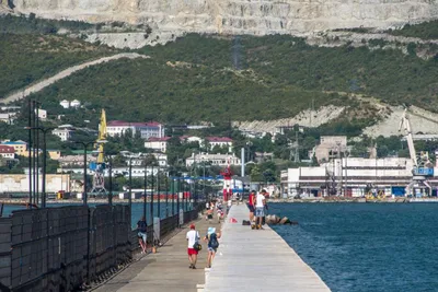 Фото на айфон с отдыхающими у моря: мгновение, замороженное во времени