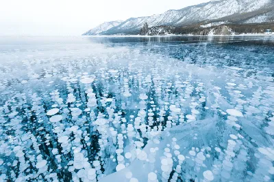 Зимний фотоальбом: изображения Байкала с выбором размера.