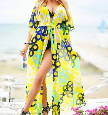 Парео на пляже: модный тренд этого лета