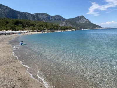 Изображения пляжа Лара Анталья с кристально чистой водой