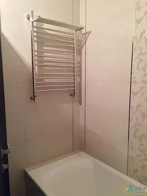 Фото полотенцесушителя над ванной в формате JPG