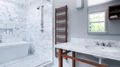 Фото полотенцесушителя водяного в стильной ванной комнате
