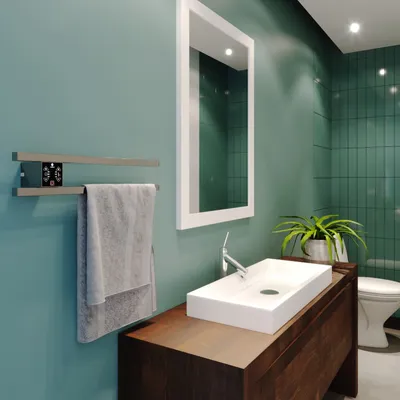 Как выбрать идеальное место для полотенцесушителя в ванной комнате