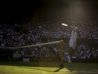Изображения Роджера Федерера во время матчей