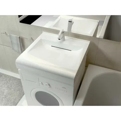 Уникальные идеи для оформления ванной: стиральная машина под раковиной.