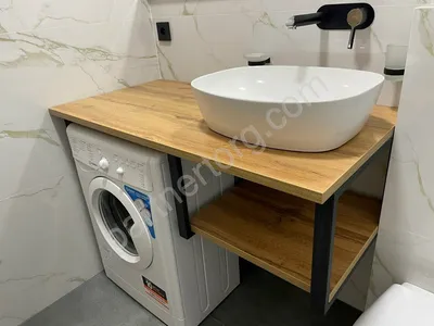 Как сделать ванную комнату более практичной: стиральная машина под раковиной.