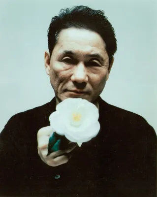 Изображения Такеши Китано в образе музыканта