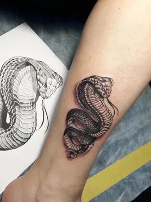 Татуированные змеи для девушек: изящные и независимые фотографии