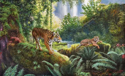 Фотография дикого тигра среди зеленых деревьев