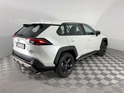 Фотографии Toyota RAV4 2023 на заднем плане заката