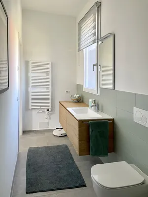Функциональность и стиль в узкой длинной ванной комнате: фото и дизайн