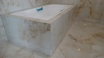 Фото ванны из керамогранита, придающей ванной комнате стиль и изысканность