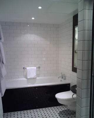 Ванна в белом цвете: идеальное дополнение к вашей ванной комнате на изображении