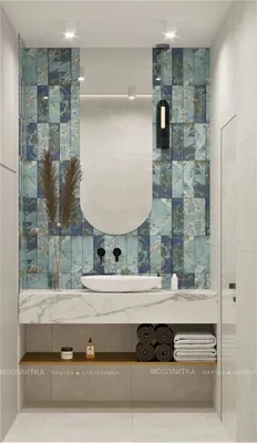 Фото ванной комнаты с модной ванной в голубом цвете