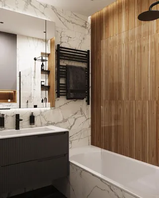 Изысканная ванная комната с мраморными деталями и акцентами