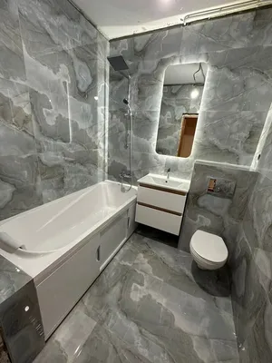 Фото ванной комнаты с плиткой под мрамор: вдохновение для интерьера