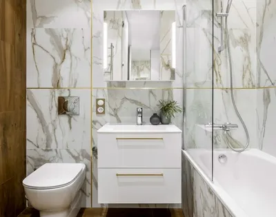 Фотография ванной комнаты с мраморной плиткой