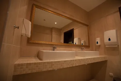Фото ванной комнаты в оранжевом цвете - тренды 2024