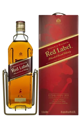 Фотография виски red label на фоне снежных гор