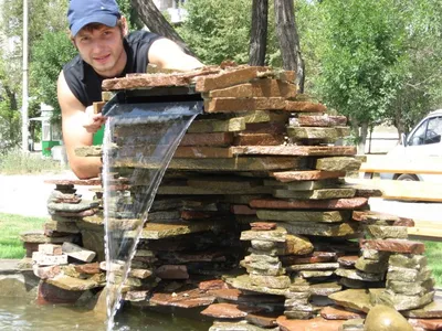 Удивительно художественный водопад, выполненный на заказ - фото