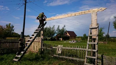 Деревянные ворота, созданные для вечности (Фото)