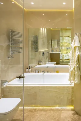 Зеркало над ванной, придающее пространству роскошный вид