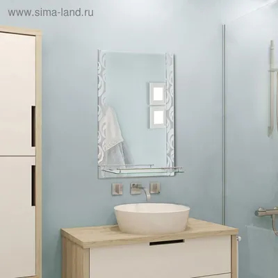 Фотография зеркала в ванной комнате с полкой