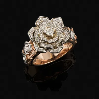 Фото золотых колец в форме розы в высоком разрешении